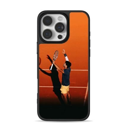 Carlos Alcaraz serving on clay tennis court Phone Case