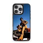 Bruce Lee in brown suit on car iPhone 16 Pro Max Black Case
